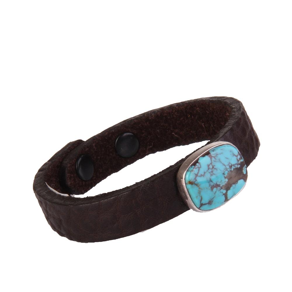 crystal head bracelet cut in black and turquoise leather